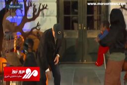 بایدن در مراسم هالوین در حال شکلات دادن به کودکان + فیلم