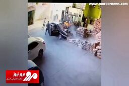سقوط مصالح ساختمان بر روی خودروی لوکس + فیلم
